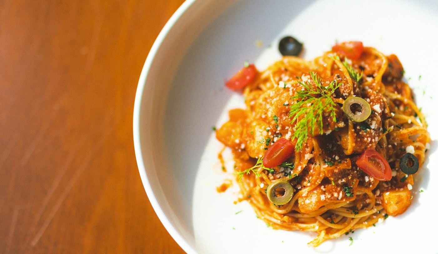 A bowl of creamy herb pasta